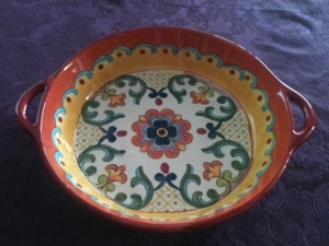 Sarajane sent him with presents. She knows I love colorful dish ware.