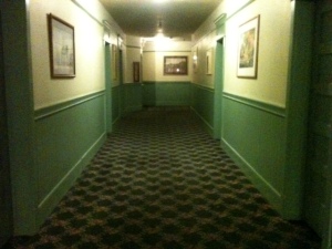 The hall was a warren of hallways in every direction.
